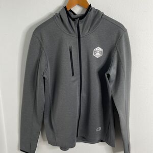 OGIO athletic zip up jacket.  Size Medium. Blue Pac embroidered emblem.